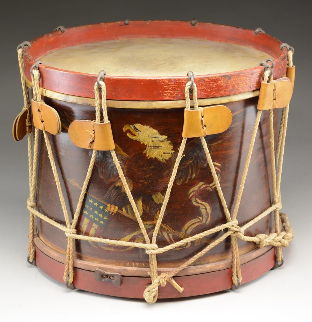 FINE RESTORED CIVIL WAR EAGLE DRUM.: 14" high, 16" diameter. Beautiful painted American eagle holding American flag in talons. Heads, ropes, and snares restored. Repair label inside dated 1985, Ralph E. Eames, Wakefield, Mass. CONDITION: