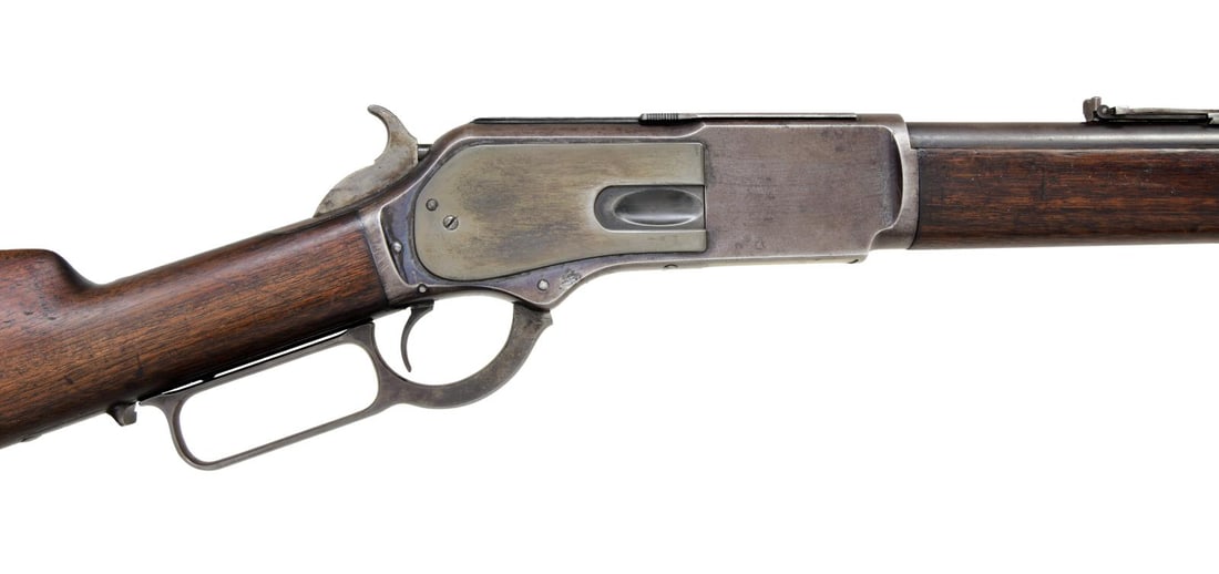 WINCHESTER 1876 LEVER ACTION EXPRESS RIFLE.: Cal. 50-95 Express. S# 26416. Bbl. 22" round. Sporting front sight w/ graduated leaf rear sight. Full length mag. Dust cover is marked "WINCHESTER EXPRESS / 50 CAL. 95 GRS.". 8 1/4" forearm & straight