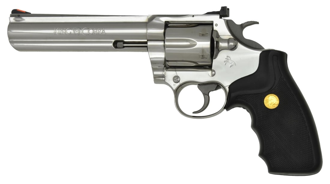 COLT KING COBRA DA REVOLVER.: Cal. 357 Magnum. S# C9871K. Bbl. 6" w/ solid rib & full ejector lug. Red ramp front sight w/ white outline adj. rear sight. Six shot fluted cyl. Stainless steel construction w/ bright finish. Black ne