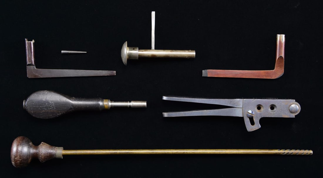 GOOD COLT ACCOUTREMENTS.: 1) Civil War Era Model 1851 Navy mold, "COLT’S / PATENT" sprue cutter, sm. 2 stamped on one side, retains about 90% thinning blue finish overall. 2) "L" shaped early 1851 Navy nipple wrench (Rap