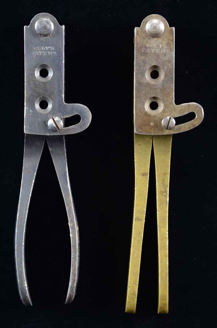 TWO FINE COLT 44 CALIBER DRAGOON BULLET MOLDS.: 1) 2nd model military (Rapley M #14), brass straight legged, inspected "WAT", steel "COLTS / PATENT" sprue cutter with inspection letter "R", steel has traces of case colors, brass has scattered sm. d