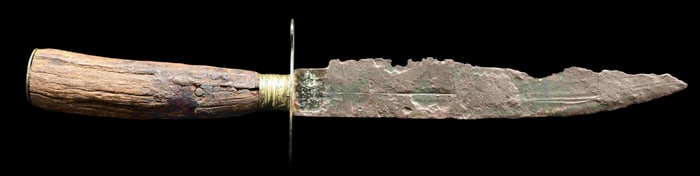 A BELT KNIFE SALVAGED FROM THE WRECK OF THE USS