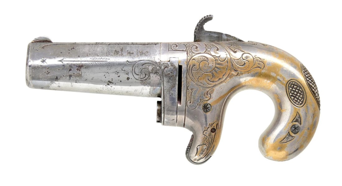 ALL SILVER MOORE DERRINGER.: SN 1599. Cal. 41. Standard configuration of the silver plated 5th variation of Moore derringers, 2.5" ovoid barrel marked on top "MOORE'S PAT. F. A. CO. BROOKLYN, NY" and "D. MOORE'S PAT. FEB. 24, 186