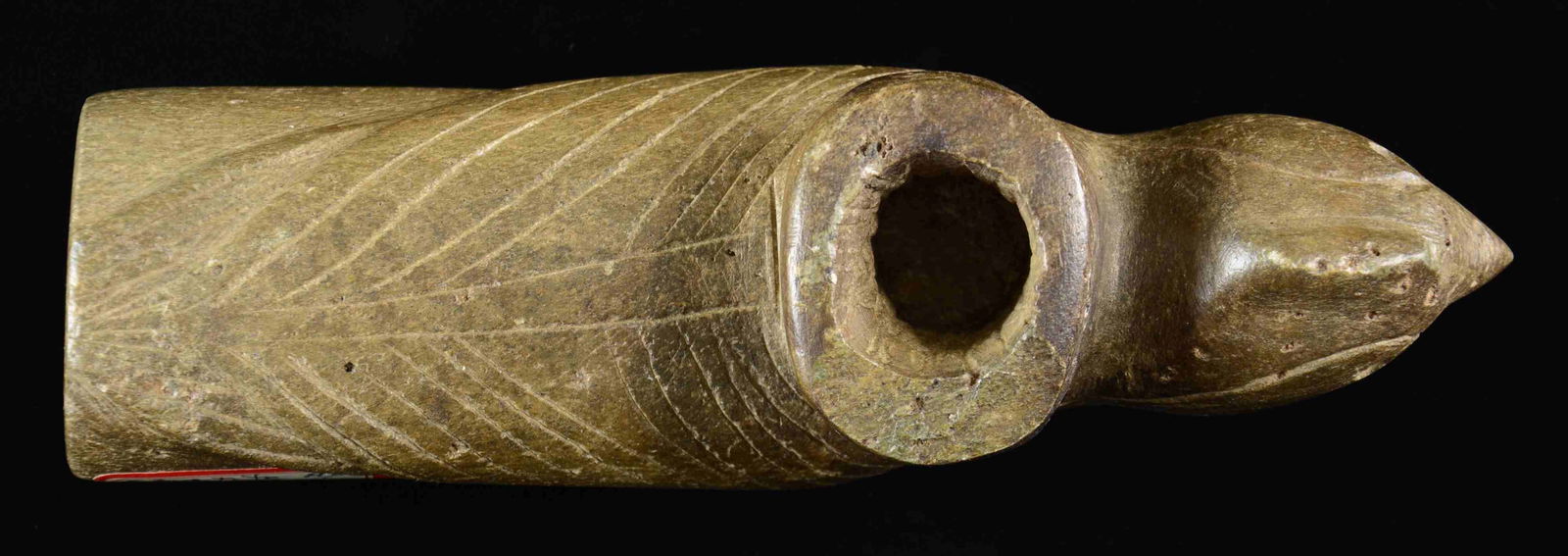 ARCHAIC STYLE CARVED STONE "BIRD EFFIGY PIPE".: 7.5" long, 2.74" high, 2" wide. Collection tag: "steatite pipe / Clay Co. / North Carolina / Hiwassee River". CONDITION: very good, chipping on bowl. (02-22685/JS). $200-300.