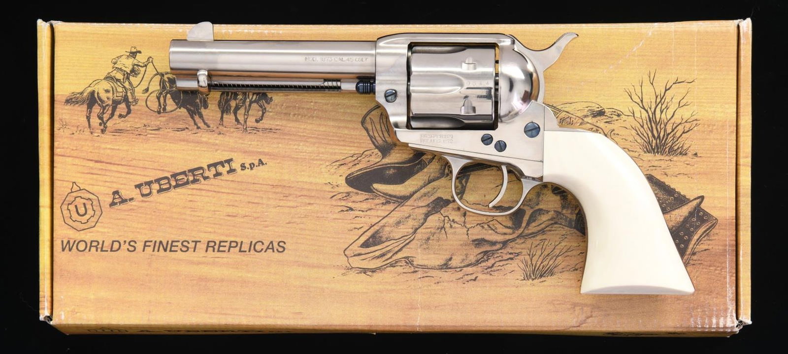 UBERTI 1873 CATTLEMAN CODY SA REVOLVER.: Cal. 45 Colt. S# UX0844. Bbl. 4 1/2". Blade front sight. Fixed rear sight. Nickel finish with fire blued screws. Simulated ivory grips. UNATTACHED ACCESSORIES: matching numbered factory box with manua