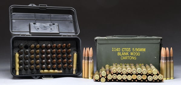 LOT OF 50 BMG AMMO & 4 AMMO CANS.