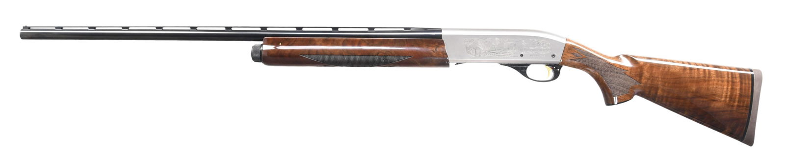 REMINGTON MODEL 11-87 DUCKS UNLIMITED 2006 SPECIAL: EDITION SEMI AUTO SHOTGUN. Cal. 20 Ga., 2 3/4" & 3". S# 06DU1793 (2006). VR 27 1/2" with white front bead. Fitted for Remchokes; Full, Mod & IC included. Satin finished receiver with engraving. Walnut