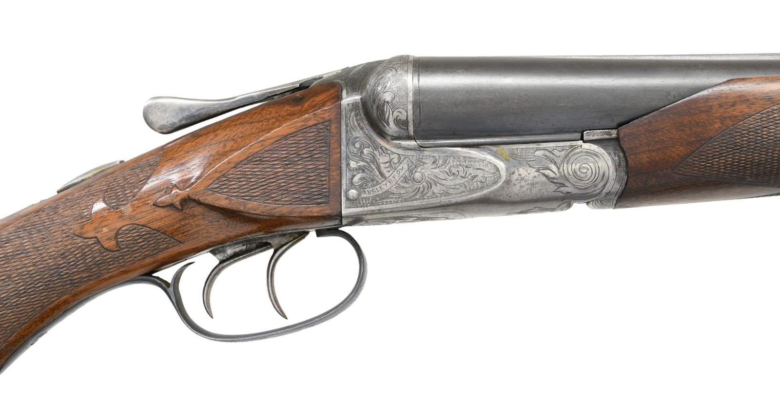 A.H. FOX A GRADE SXS SHOTGUN.: Cal. 12 ga. 2 5/8". S# 26845. Bbls. 28" of Chromox fluid-compressed steel. White front & mid beads. Case-colored boxlock action with late-style deep A-grade engraving. Engraving consists of foliate sc