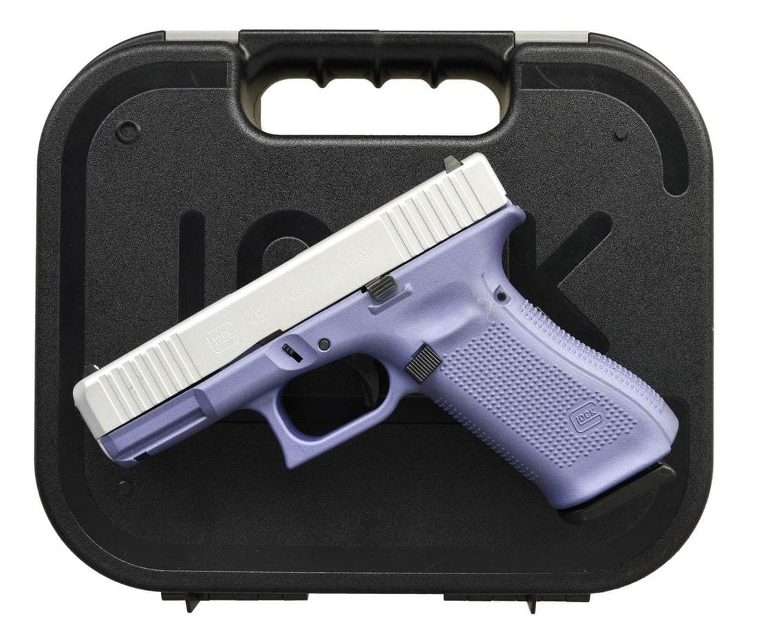 GLOCK 45 SEMI AUTO PISTOL.: Cal. 9mm. S# AGEC814. Bbl. 4". Standard white outline Glock sights. Glock 45 professionally refinished by Apollo Custom of Greensboro, NC. Silver-finished slide with front and rear serrations. Ambi sl