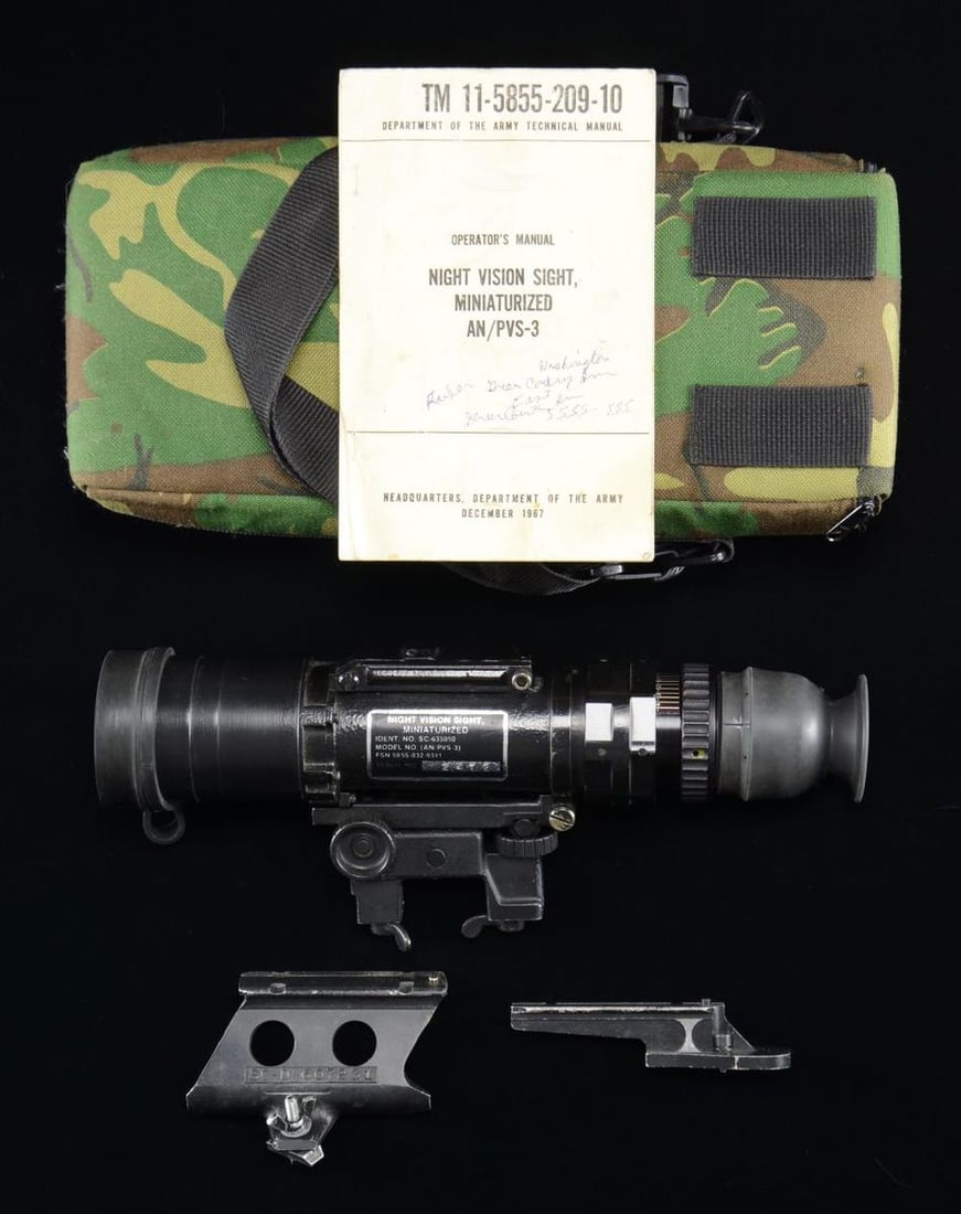 MINIATURIZED AN PVS-3 NIGHT VISION SIGHT.: S# 2472. Overall: 14.5" including eye cup. Black finish. Used on the M14 or M1A rifle. Comes with nylon carrying case containing paperwork, Dec. 1967 manual, mount & rail. CONDITION: Scope has good fi
