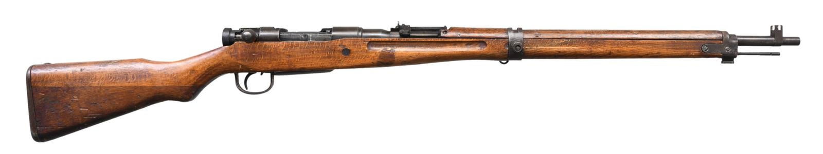 WWII JAPANESE NAGOYA TYPE 99 BOLT ACTION MILITARY: RIFLE. Cal. S# 94186. Bbl. 25 1/2". Receiver has intact "MUM" and Type 99 characters. Ladder rear sight graduated to 1,500 meters with AA wings. Inverted V front sight with protective ears. Oval bolt