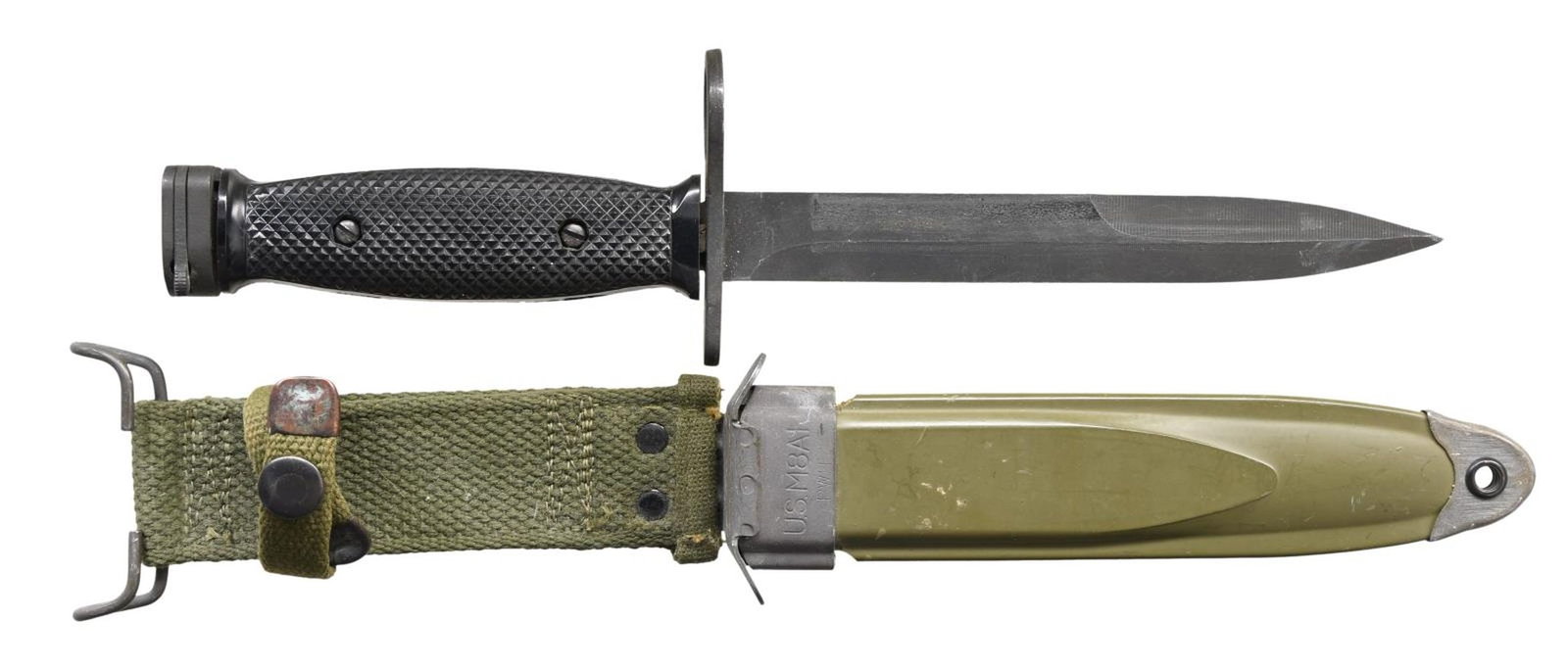 VIETNAM WAR ERA US MILPAR M7 BAYONET.: Vietnam-era Milpar M7 bayonet for the M16 rifle with scabbard and canvas frog. Crossguard has "US M7" and Milpar markings. Metal parts have parkerized finish. Checkered black grips. Grips display a lo