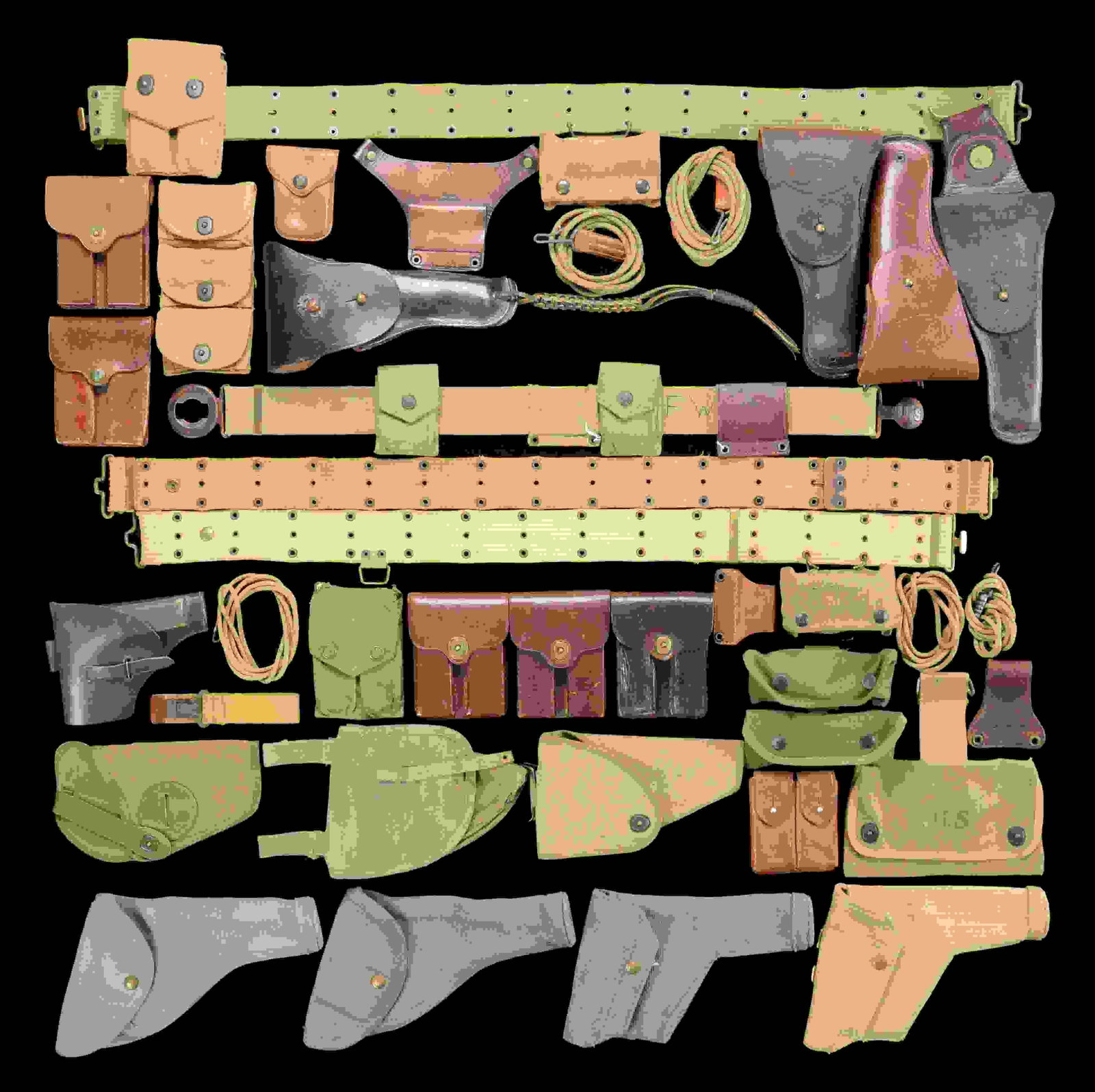 LARGE GROUP OF PRIMARILY US MILITARY HOLSTERS,: BELTS, MAGAZINE POUCHES, ETC. Large lot of primarily US military holsters, belts, mag. pouches, and more, including: 1) Model 1909 brown leather holster mfg. by Graton & Knight. Front of holster body 