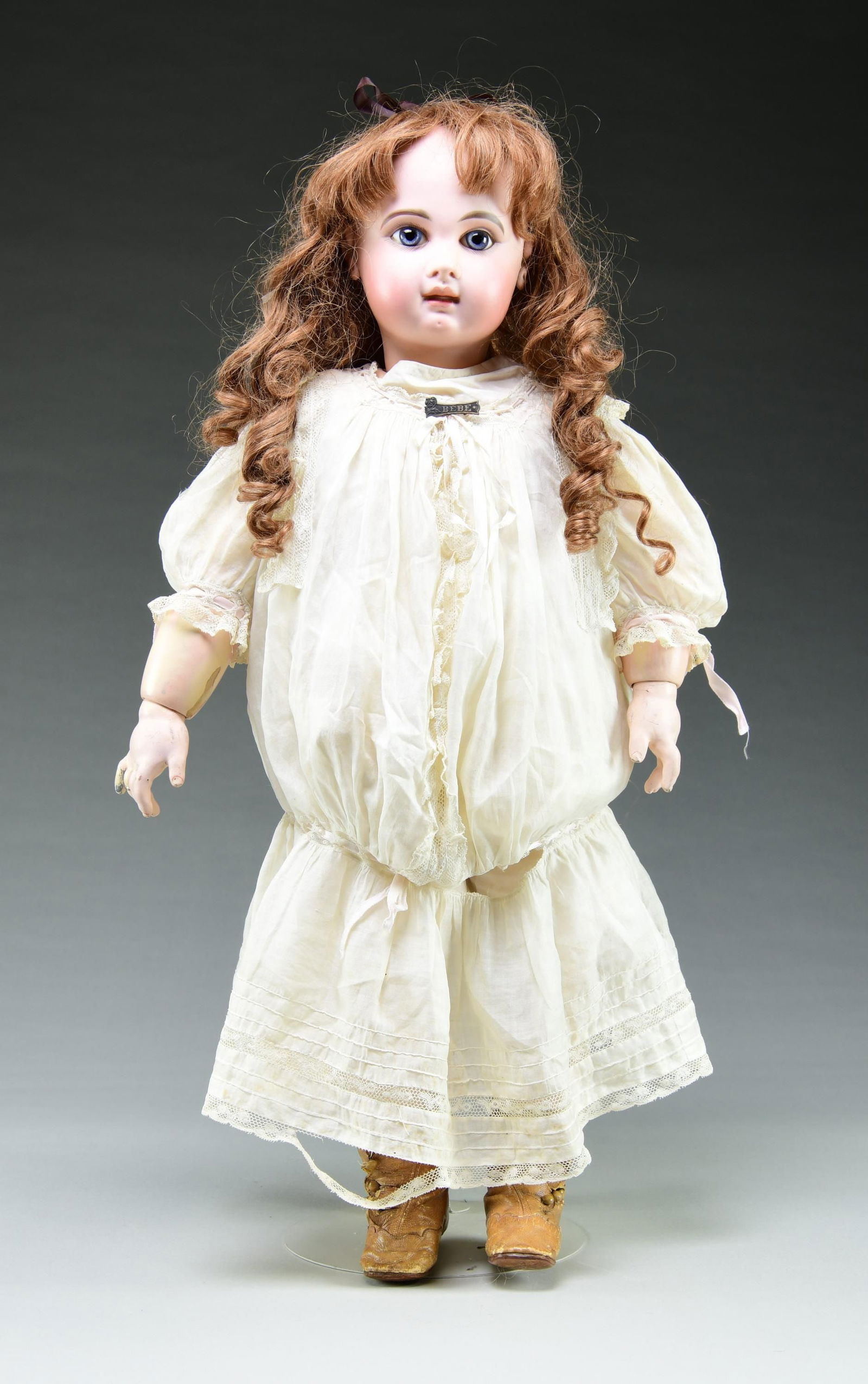 FRENCH BISQUE CLOSED MOUTH JUMEAU HEAD DOLL. (1 of 4)