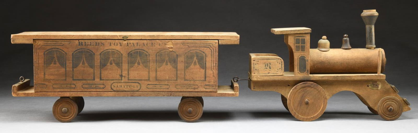 W.S. REED WOODEN TOY TRAIN. (1 of 2)