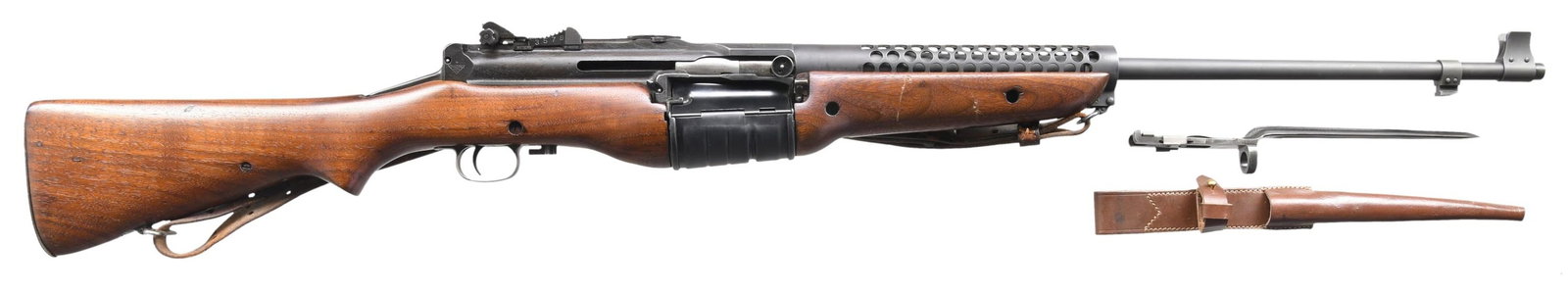 WWII DUTCH CONTRACT JOHNSON MODEL 1941 SEMI-AUTO: MILITARY RIFLE. Cal. 30-06. S# A1571. Johnson rifles rarely if ever have matching S#s as they were not matched at the time of manufacture. The Johnson rifle was designed by Marine Captain Melvin M. Jo