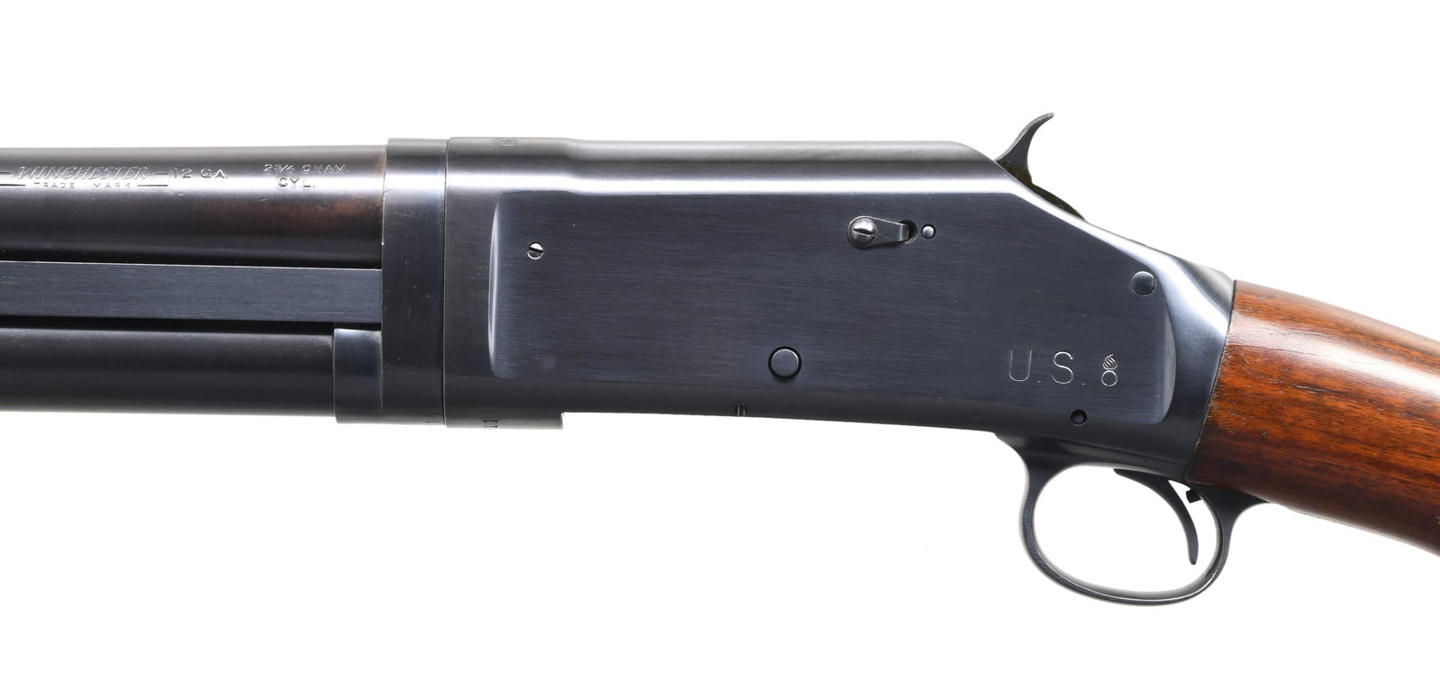 WINCHESTER 97 TRENCH STYLE SLIDE ACTION SHOTGUN.: Cal. 12 ga., 2 3/4". S# 955011. Bbl. flaming bomb marked 20" cyl. bore. Takedown riot style shotgun w/ added 4 row hand guard & steel bead. Front bead hole in bbl. forward of hand guard is filled. Tak