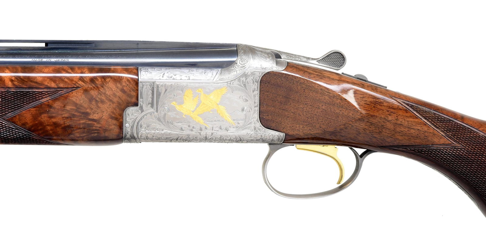 BROWNING CITORI GRADE VI LIGHTNING O/U SHOTGUN.: Cal. 28 ga 2 3/4". S# 25784NZ973. Bbl. 26" vent rib w/ fixed Imp cyl. & Mod chokes. White target front sight w/ steel mid bead. Satin silver finished boxlock action w/ gold finished SST & ejectors. Go