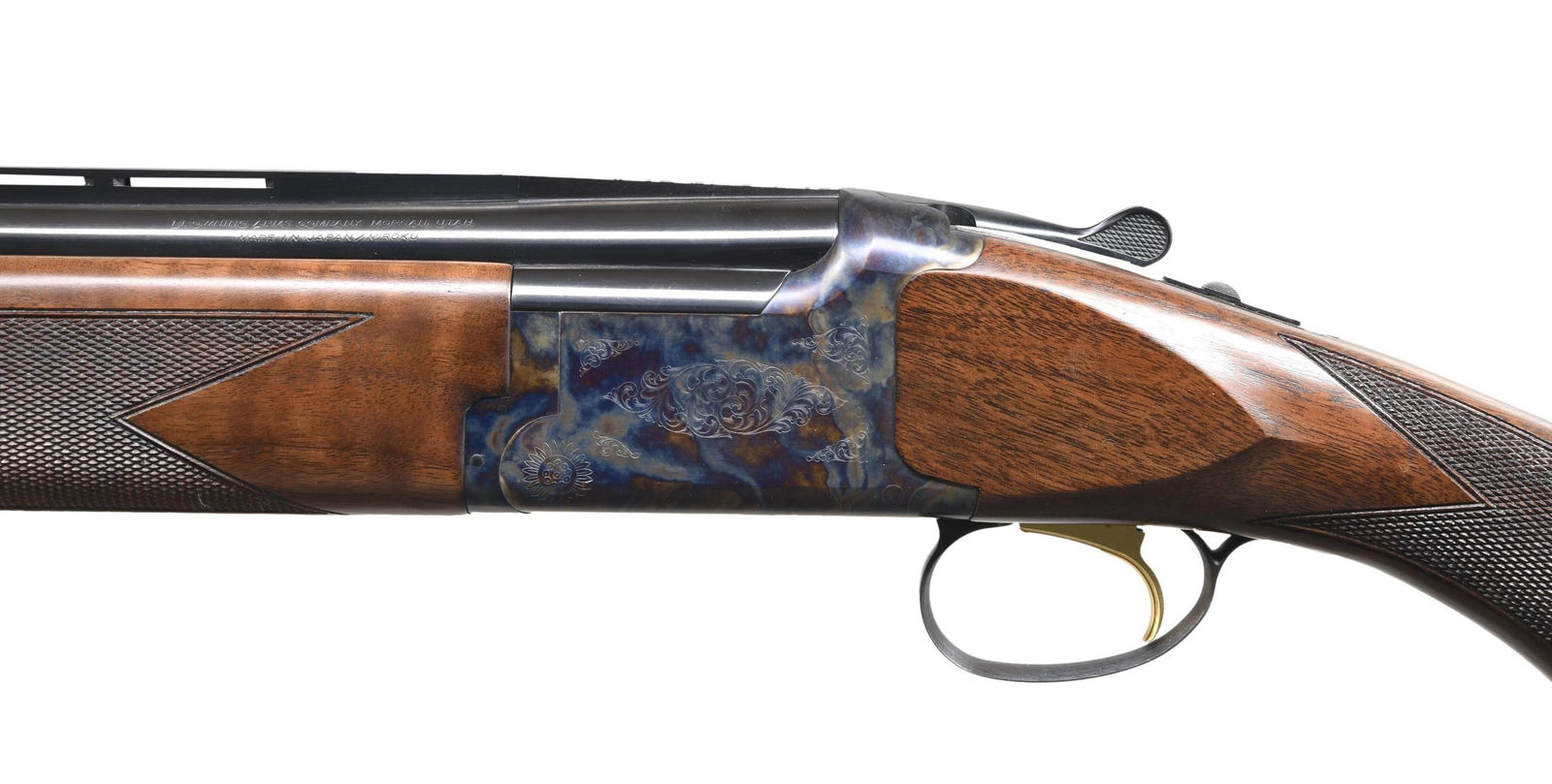 BROWNING CITORI GRADE 1 LIGHTNING CASE COLORED O/U: SHOTGUN. Cal. 12 3". S# 18584MP131. Bbls. 28" vent rib w/ white target front sight & Invector Plus chokes. Imp Cyl. & full choke tubes included. Case colored boxlock action w/ grade 1 scroll ornamenta