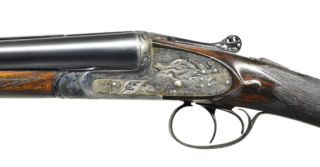 SIDELOCK SXS GAMEGUN BY FAISAN.: Cal. 12 ga. 2 1/2". S# 18154. The 27 1/4" dovetailed bbls. fitted with narrow game rib are engraved "Marca Faisan" on top of left bbl. Bbl. flats are stamped with pre 1927 Spanish Nitro proofs. Bottom
