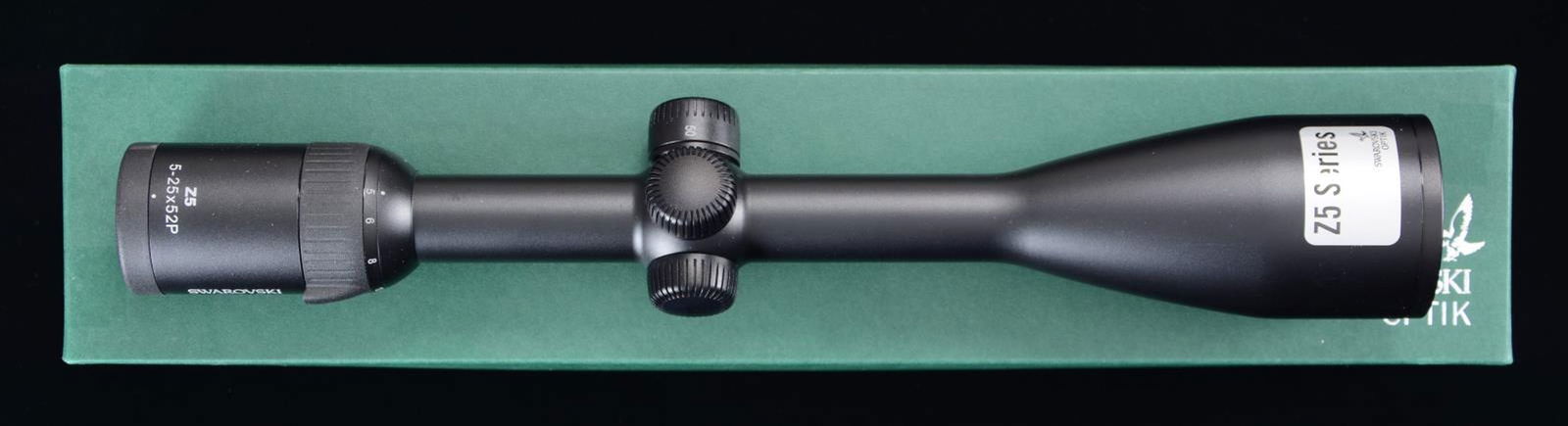 SWAROVSKI OPTIK Z5 5-25x52 P L BRH SCOPE.: S# MC8830791. Model 59886 is 15" overall with a 1" tube with BRH reticle. It comes with a matching numbered box, lens caps, and paperwork. UPC: 708026598869. CONDITION: scope has a near-excellent fini