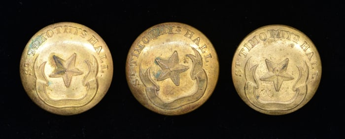 3 COAT SIZE SAINT TIMOTHY'S HALL BUTTONS.