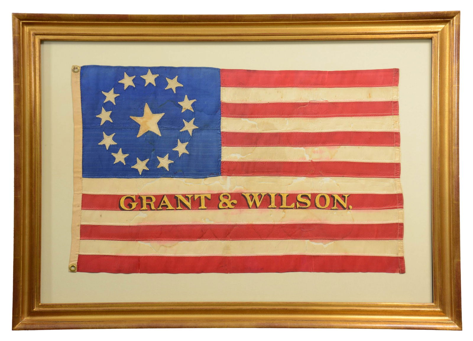 VERY RARE ULYSSES S. GRANT & HENRY WILSON 13 STAR: 1872 PRESIDENTIAL CAMPAIGN FLAG. 15" x 25" hand sewn silk stars, 12 1.25" circling 2.75" central star, stars are single applique but cut out on reverse exposing 1" stars around 2.5" center star "GRANT