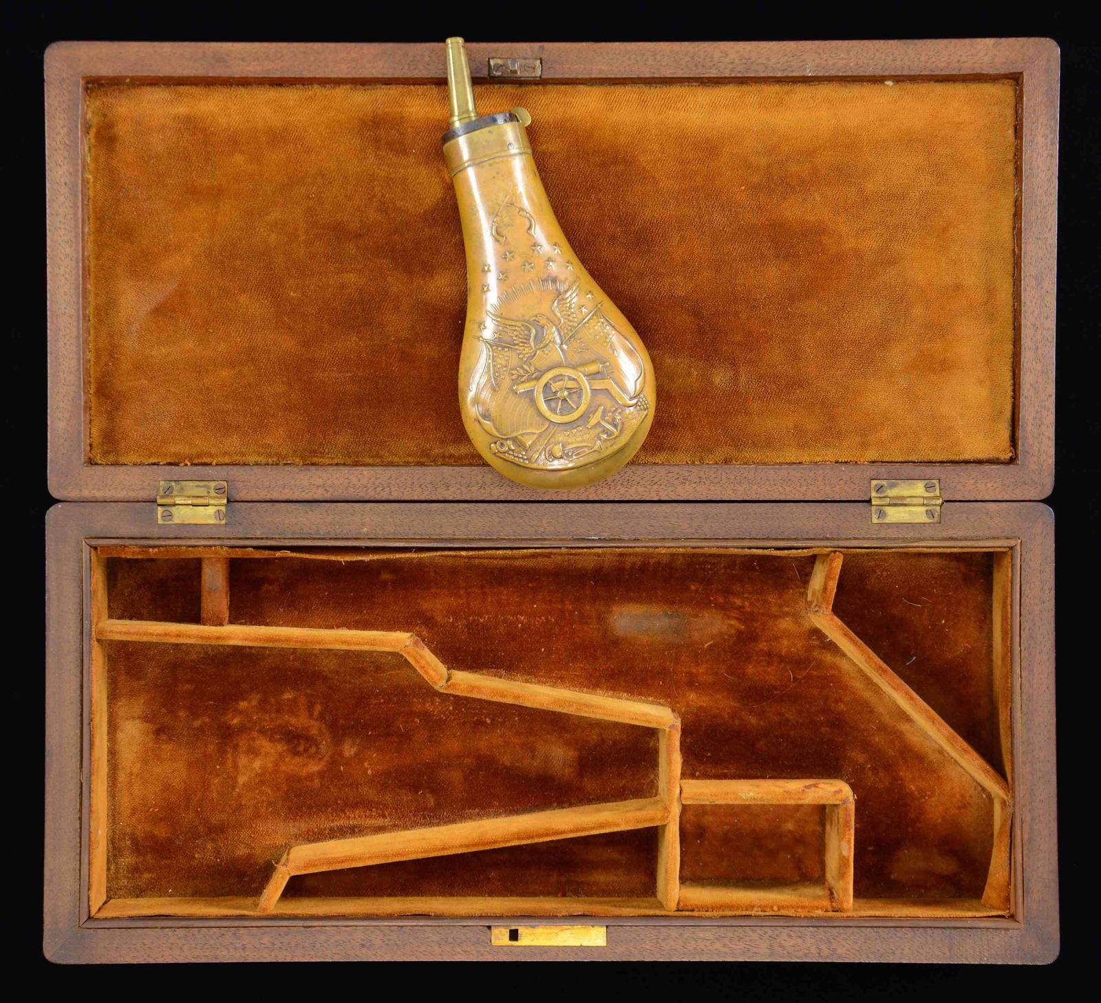 CASING & FLASK FOR COLT NAVY REVOLVER.: Wooden presentation of unknown origin or age. Faded orange cloth fitted interior for a Model 1851 Navy revolver. Case contains a brass flask approx. 5 1/4" long w/ double sided motifs. Motif features