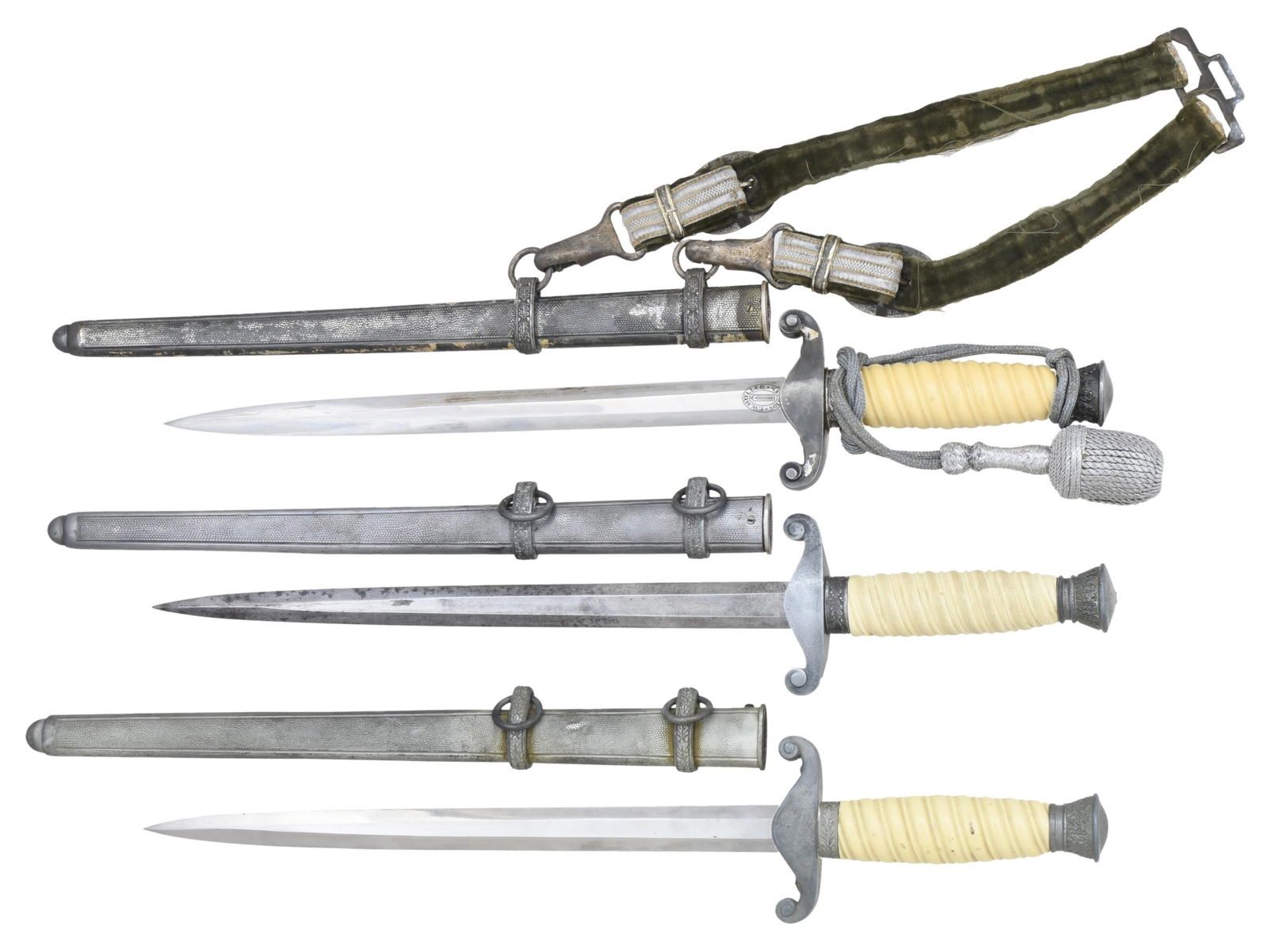 3 WWII GERMAN ARMY DAGGERS.: 1) An early war dagger measuring 15 1/4" in length with a plain blade marked "F.W. HOLLER (logo) SOLINGEN". Plated eagle crossguard with plated oak leaf/acorn decorated pommel and ferrule. Composite c