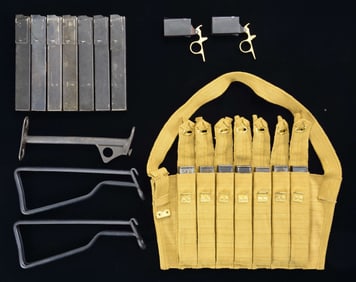 GROUPING OF BRITISH STEN SMG MAGAZINES & PARTS.