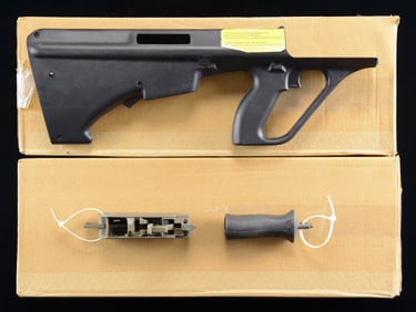 2 BLACK STEYR AUG NATO STOCKS WITH HAMMER PACKS.