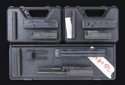 GROUPING OF 3 UZI CALIBER CONVERSION KITS.