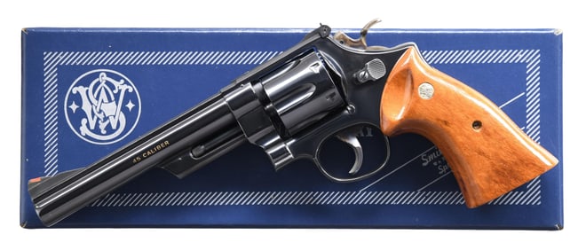 SMITH & WESSON 125th ANNIVERSARY REVOLVER SET.