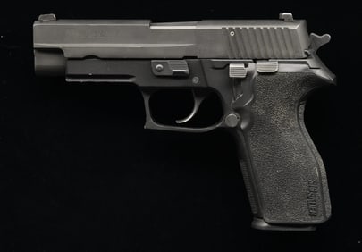 SIG SAUER P227 SEIM-AUTOMATIC PISTOL.