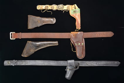 LOT OF 5 ASSORTED HOLSTERS.