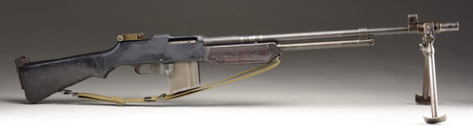 WWII ERA BAR-DUMMY / DISPLAY GUN.: Cal. 30-06. Bbl. 24". Display version of the iconic BAR. The receiver section is an aluminum blank. Parts, such as the barrel are actual BAR parts. Barrel is an AOC marked "5-44" w/ flaming bomb. Barr