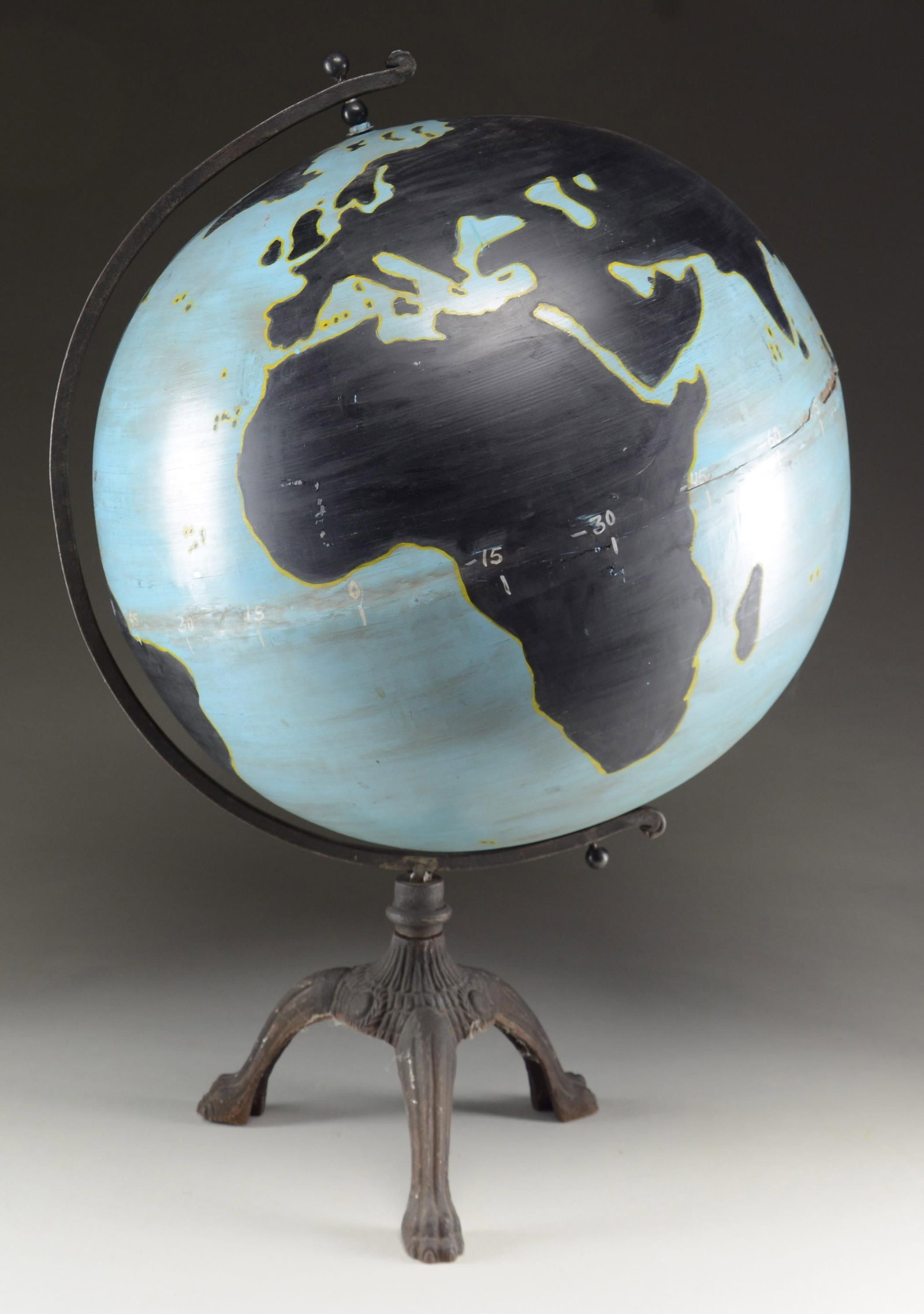 EXCEPTIONAL DENOYER GEPPERT US NAVY GLOBE OF WWII.: This rare painted steel globe was designed by the Denoyer Geppert Company for the US Navy. It was created to be written on with chalk and then wiped clean in order to plan long-range flights and opera