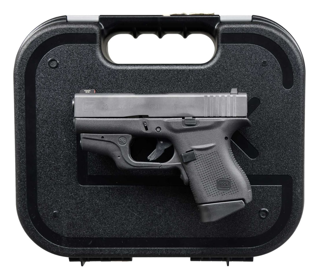 GLOCK 43 SEMI AUTO PISTOL WITH FACTORY CASE.: Cal. 9x19. S# BDER260. Bbl. 3 1/2". Ameriglo large dot tritium front sight. Blacked out rear sight. Crimson Trace Laser present on trigger guard. Matte black finish. Talo edition & Austrian made Glock