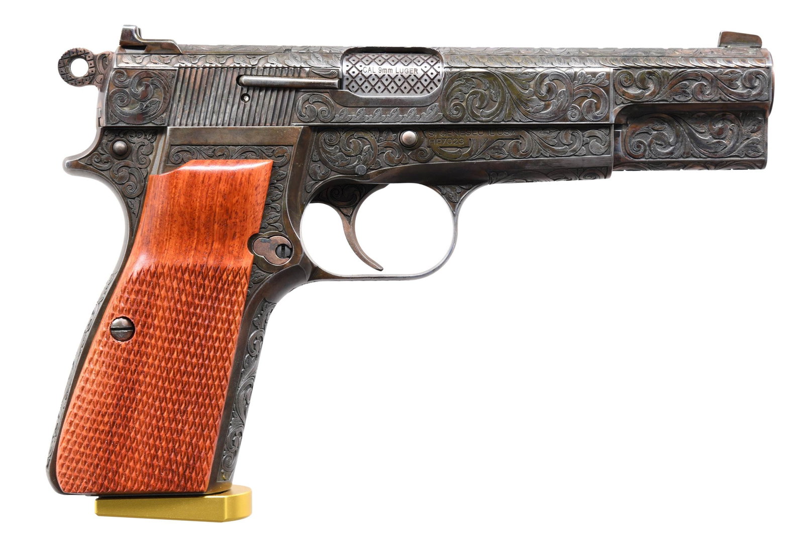 BEAUTIFULLY ENGRAVED & CASE COLORED SPRINGFIELD: ARMORY SA-35 SEMI-AUTOMATIC PISTOL. Cal. 9x19mm. S# HP7023. Bbl. 4 5/8". SA-35 semi-automatic pistol mfg. by Springfield Armory. Frame is marked with Springfield's mfg. information and the S# on the r