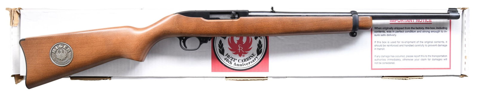 RUGER 10/22RB-40 SEMI AUTO CARBINE WITH MATCHING: FACTORY BOX. Cal. 22 LR. S# 255-74254 (2004). Ruger Model 01160. Barrel 18.5". Bead front & folding rear sight. Birch stock with Ruger 10/22 40th Anniversary medallion in right side of buttstock & Cel