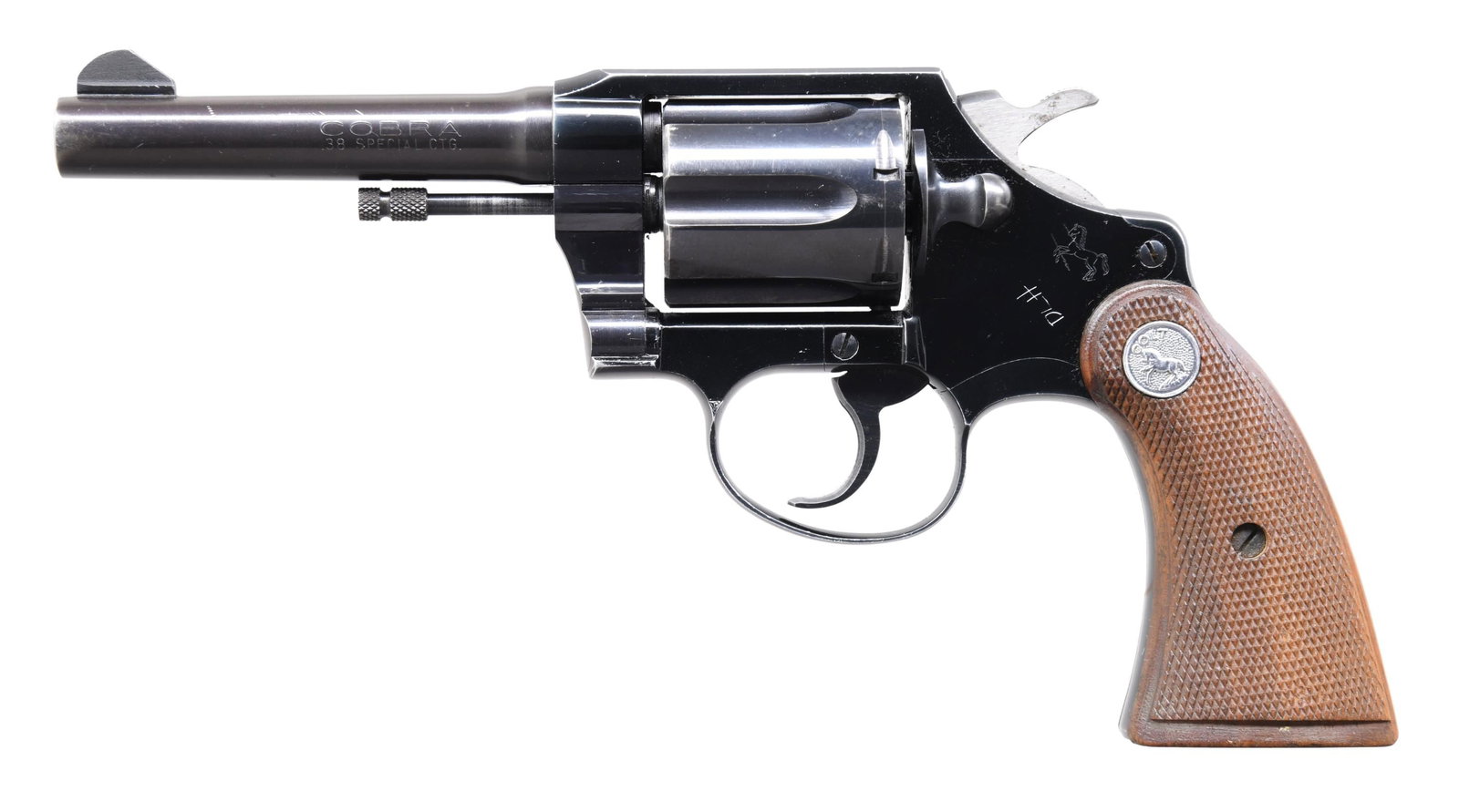 COLT COBRA DOUBLE ACTION REVOLVER.: Cal. 38 Spl. S# 46823LW. Bbl. 4". Cobra double action revolver mfg. by Colt in 1956. Left side of the bbl. is marked "COBRA" above the cal. designation, with Colt's single line address marked across t