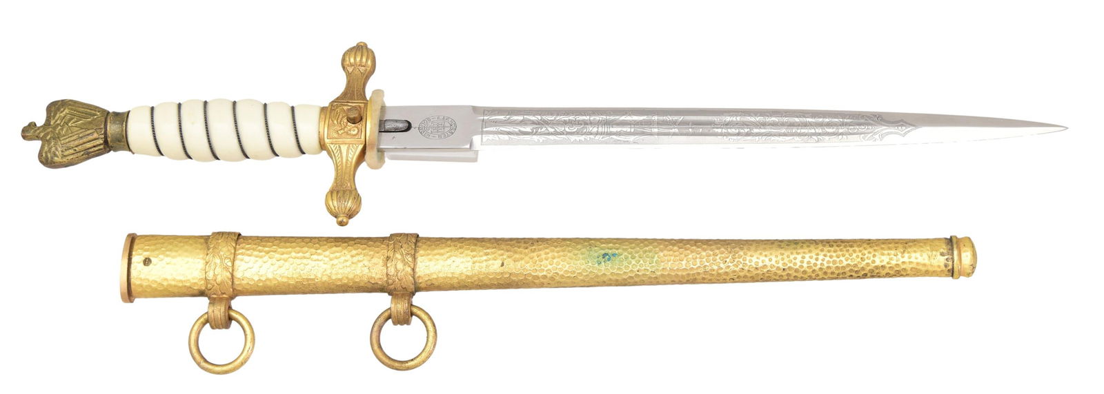 WWII GERMAN KRIEGSMARINE DAGGER.: Overall length: 17 1/8". Blade is etched throughout most of its length with foliate and nautical motifs. The ricasso is marked "E.&F. HORSTER (logo) SOLINGEN". Gilded brass crossguard and eagle pommel