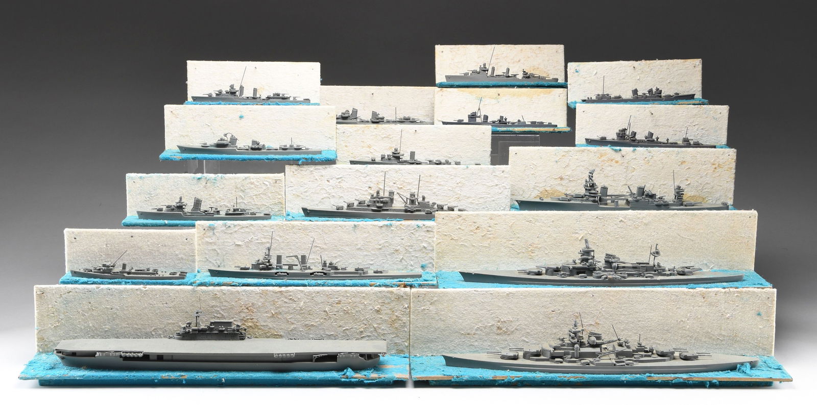 17 WWII NAVAL SHIP IDENTIFICATION MODELS.: This group represents a variety of ship identification models of the WWII era produced by the United States. The scale is assumed to be 1-500, however the bow to stern measurement varies between 28" t
