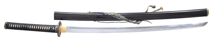 JAPANESE KATANA WITH BLACK AND GOLD MOUNTS.