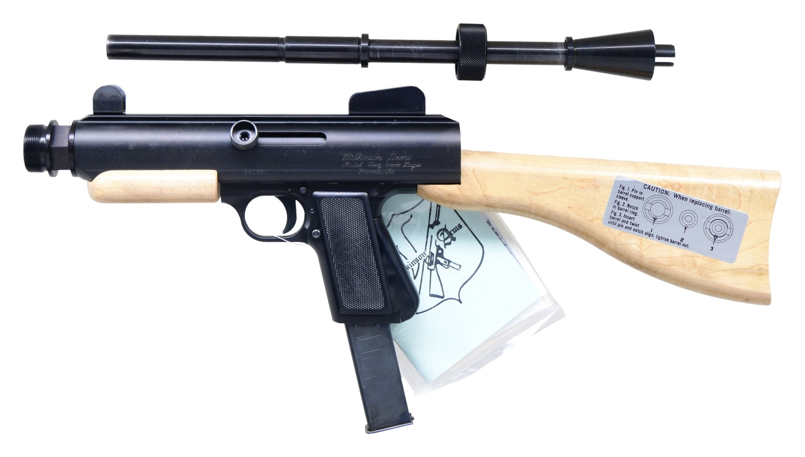 AS NEW IN BOX WILKINSON ARMS TERRY CARBINE.: Cal. 9mm Luger. S# 881321. Bbl. 16". The Wilkinson Arms Terry was originally designed in 1960 by Ray Wilkinson of J&R Engineering. Originally having a more typical numerical model designation, after J