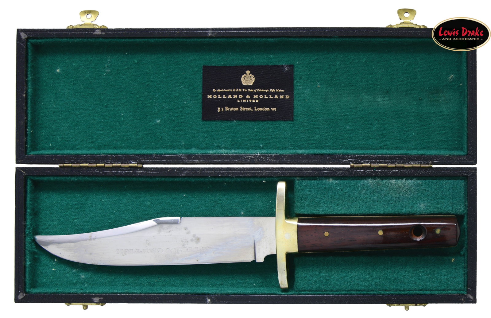 RARE HOLLAND & HOLLAND 150TH ANNIVERSARY: COMMEMORATIVE ENGLISH BOWIE KNIFE WITH CUSTOM DISPLAY CASE. Please note as of 5/9/25 this item description has been updated. Please revisit this description and contact us with any questions. Approx. 