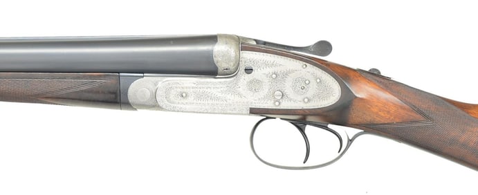 UGARTECHEA ASSISTED OPENING SIDELOCK SHOTGUN.