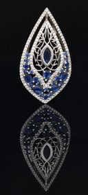 WHITE GOLD, SAPPHIRE AND DIAMOND RING.