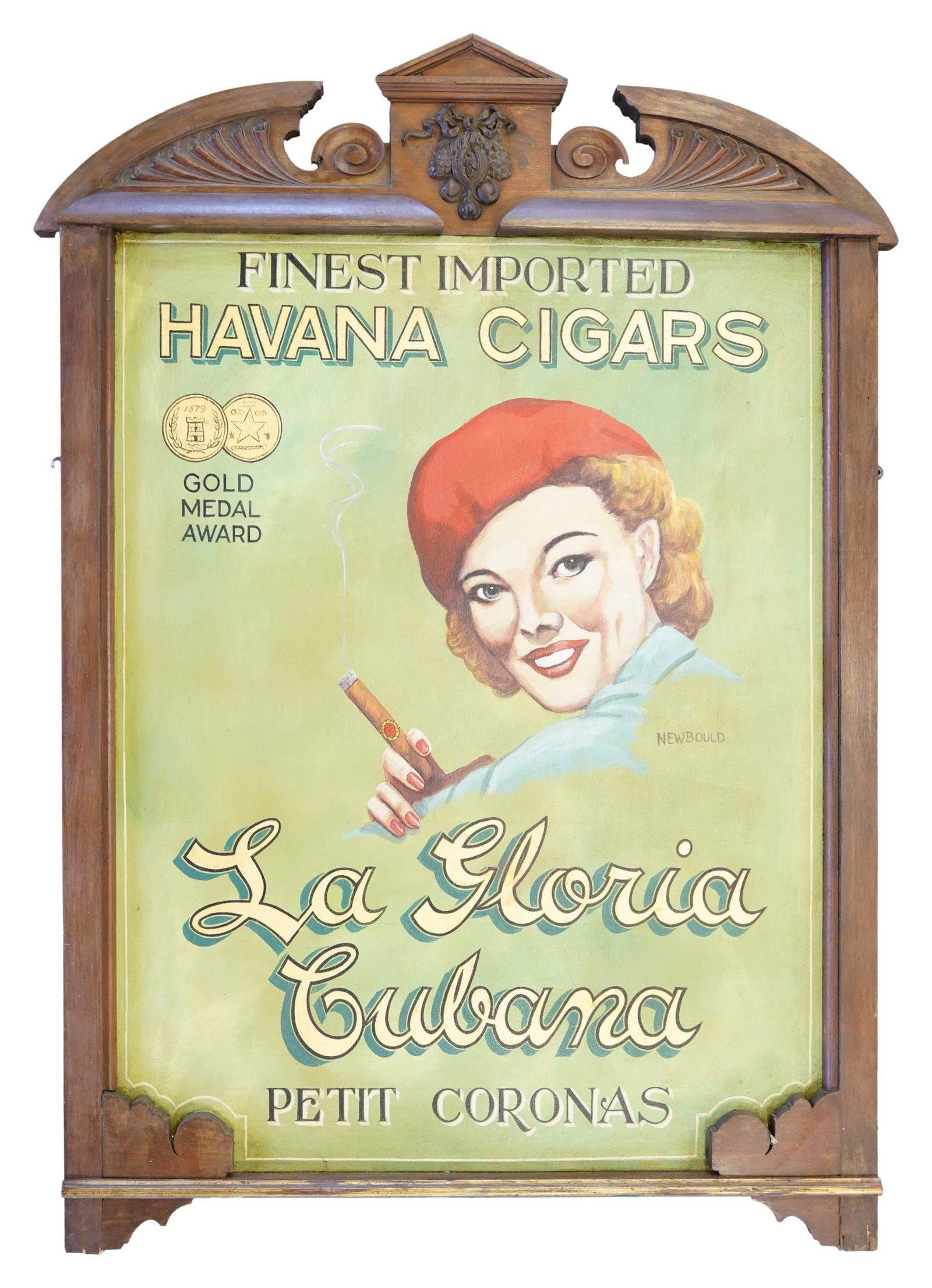 DECORATIVE 19th CENTURY TRADE SIGN WITH A SUPERB: 20TH CIGAR ADVERTISING IMAGE. This heavy and very sturdy advertising sign, measures approximately 37 ? x 54?". It has a dark brown, likely mahogany, frame with sculpted top featuring a classical broke