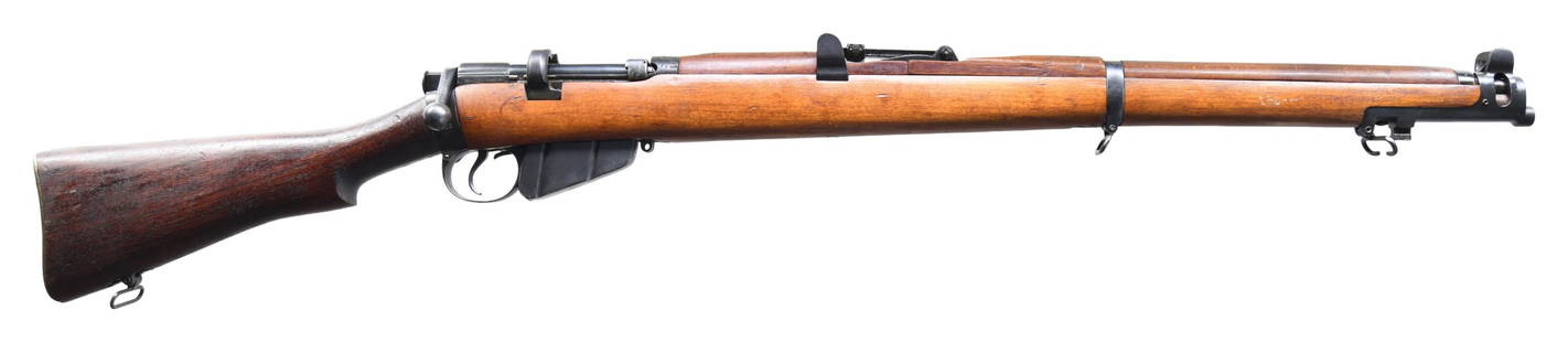 IRISH MARKED ENFIELD SMLE III BOLT ACTION RIFLE.: Cal. 303 Brit. S# F18833. Bbl. 25 1/2" dated 1938. Blade front sight with protective ears. Tangent rear sight graduated to 2000m. Matching numbers on receiver, bolt, bbl & nosecap. Forend is unnumbere